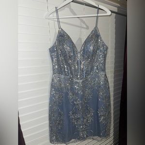 Selling my daughter's homecoming Dress. Used once for 2 hrs. Literally new.